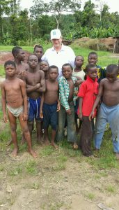H David Meyers with children of Côte d'Ivoire
