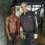 Palm Oil Côte d'Ivoire (Ivory Coast) - AgriSmart, Inc. Chairman, H. David Meyers with a palm oil worker in Côte d'Ivoire
