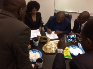 Governor Gentiny Ngobila Mbaka signing the MOU - AgriSmart DRC MOU Signed